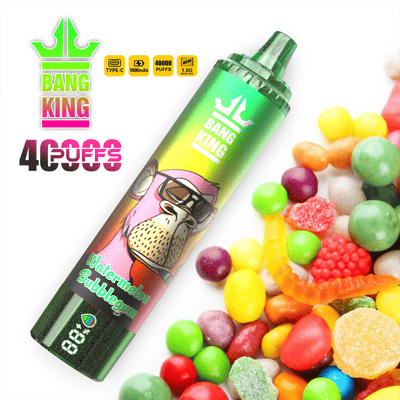 Promotional image of a Bang King Watermelon Bubblegum flavored vape device, designed in green with a cartoon ape graphic and surrounded by colorful candy.