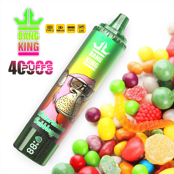 Promotional image of a Bang King Watermelon Bubblegum flavored vape device, designed in green with a cartoon ape graphic and surrounded by colorful candy.